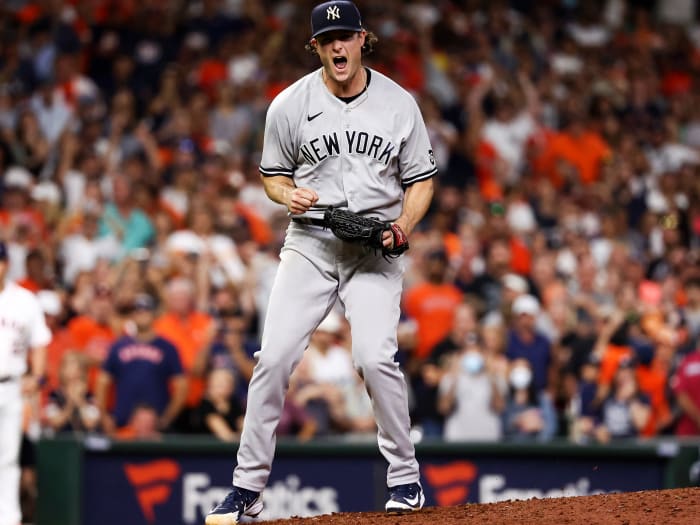 Jul 10, 2021; Houston, Texas, USA; New York Yankees starting pitcher Gerrit Cole (45) reacts after recording a strikeout against the Houston Astros to end the game at Minute Maid Park.
